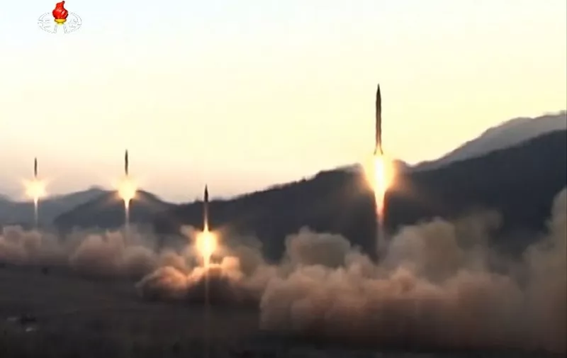This screen grab taken from North Korean broadcaster KCTV on March 7, 2017 shows ballistic missiles being launced during a military drill from an undisclosed location in North Korea. 
Nuclear-armed North Korea launched four ballistic missiles on March 6 in another challenge to President Donald Trump, with three landing provocatively close to America's ally Japan. / AFP PHOTO / KCTV / Handout /  - South Korea OUT / RESTRICTED TO EDITORIAL USE - MANDATORY CREDIT "AFP PHOTO /KCTV" - NO MARKETING NO ADVERTISING CAMPAIGNS - DISTRIBUTED AS A SERVICE TO CLIENTS