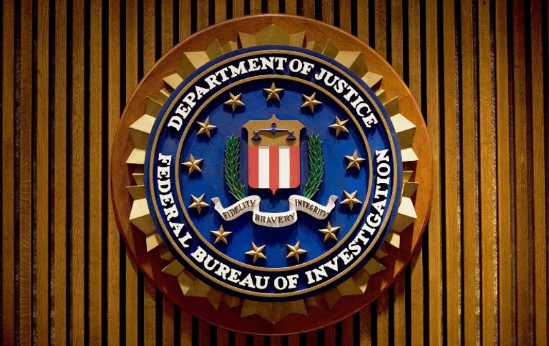 (FILES) This August 3, 2007 file photo shows a crest of the Federal Bureau of Investigation(FBI) inside the J. Edgar Hoover FBI Building in Washington, DC. The FBI on April 19 , 2015 admitted "errors" spanning several years in evidence provided in court by its forensic lab to help secure criminal convictions, including in death penalty cases. The admission follows a report by the Inspector General's Office (OIG) last July probing "irregularities" by the Federal Bureau of Investigation lab. The OIG's report found that that the flawed forensics were used in at least 60 capital punishment cases, including three in which the defendants were put to death.  AFP PHOTO/MANDEL NGAN / FILES