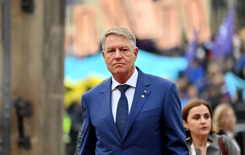 Romania's President Klaus Iohannis  arrives to attend an informal summit of the European Union (EU) in Prague, Czech Republic, on October 7, 2022. - EU leaders meeting in Prague will look to overcome divisions on how to tackle soaring energy prices as they grapple with the fallout from Russia's war on Ukraine. (Photo by Joe Klamar / AFP)