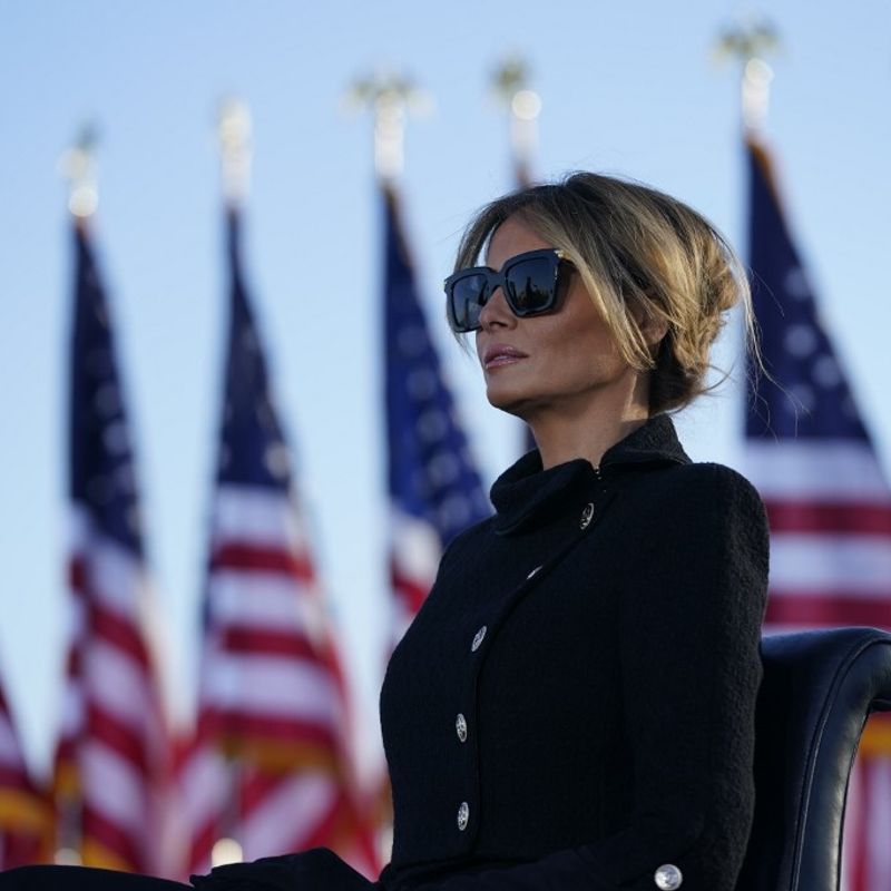 US First Lady Melania Trump speaks before boarding Air Force One at Joint Base Andrews in Maryland on January 20, 2021. - US President Donald Trump travels to his Mar-a-Lago golf club residence in Palm Beach, Florida, and will not attend the inauguration for President-elect Joe Biden. (Photo by ALEX EDELMAN / AFP)