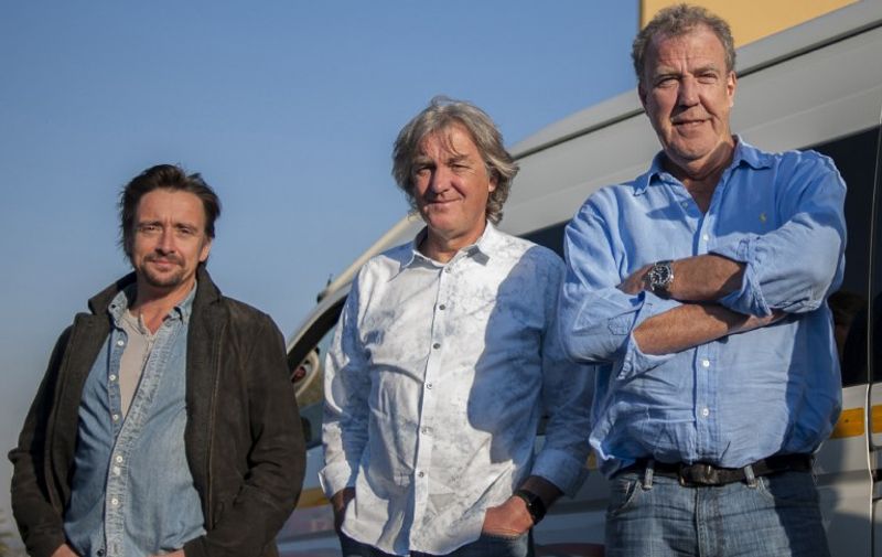 (FILES) A picture taken on June 10, 2016 shows (L-R) Richard Hammond, James May and Jeremy Clarkson posing at the Ticketpro Dome in Johannesburg, South Africa.
The former presenters of hit British motoring show "Top Gear" Friday received glowing reviews as their new show "The Grand Tour" debuted on Amazon Prime, signalling the video streaming service's global arrival. / AFP PHOTO / STEFAN HEUNIS