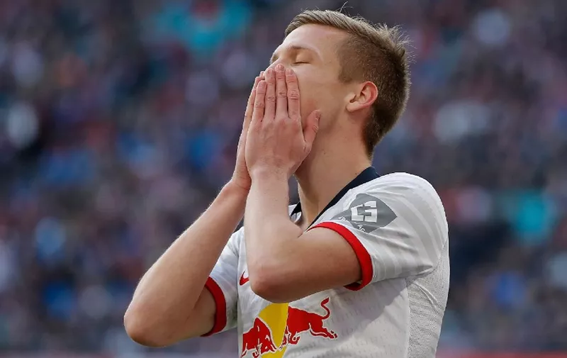 Leipzig's Spanish midfielder Dani Olmo reacts to a missed chance on goal during the German first division Bundesliga football match RB Leipzig vs SV Werder Bremen, in Leipzig, eastern Germany on February 15, 2020. (Photo by Odd ANDERSEN / AFP) / RESTRICTIONS: DFL REGULATIONS PROHIBIT ANY USE OF PHOTOGRAPHS AS IMAGE SEQUENCES AND/OR QUASI-VIDEO