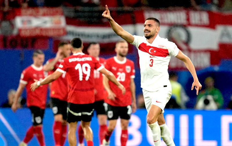 APTOPIX Turkey's Merih Demiral, right, celebrates his side's second goal during a round of sixteen match between Austria and Turkey at the Euro 2024 soccer tournament in Leipzig, Germany, Tuesday, July 2, 2024. (AP Photo/Darko Vojinovic)