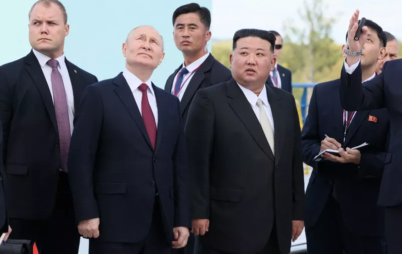 In this pool photo distributed by Sputnik agency, Russia's President Vladimir Putin (centre L) and North Korea's leader Kim Jong Un (centre R) visit the Vostochny Cosmodrome in Amur region on September 13, 2023. Russian President Vladimir Putin and North Korean leader Kim Jong Un both arrived at the Vostochny Cosmodrome in Russia's Far East, Russian news agencies reported on September 13, ahead of planned talks that could lead to a weapons deal. (Photo by Mikhail Metzel / POOL / AFP)