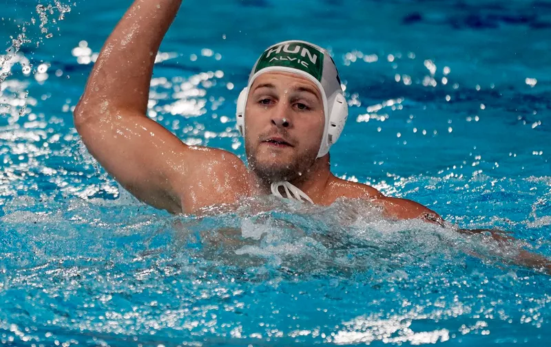 Hungary's Krisztian Manhercz plays against Italy during a preliminary round men's water polo match at the 2020 Summer Olympics, Monday, Aug. 2, 2021, in Tokyo, Japan. (AP Photo/Mark Humphrey)