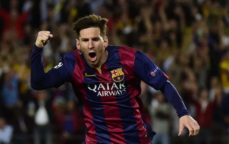 Barcelona's Argentinian forward Lionel Messi celebrates after scoring during the UEFA Champions League football match FC Barcelona vs FC Bayern Muenchen at the Camp Nou stadium in Barcelona on May 6, 2015. AFP PHOTO/ PIERRE-PHILIPPE MARCOU