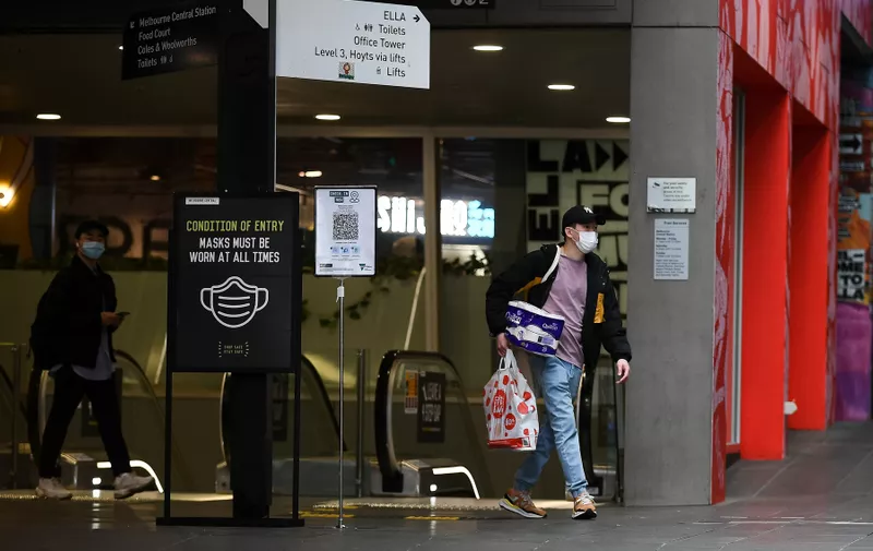 A a man carrying a pack of toilet paper walks past a "wear a mask" sign as he leaves Melbourne Central Train Station on the day that the city reopened after a city wide 14 day lockdown that was placed on the people of Melbourne because of a COVID-19 outbreak.
Melbourne Reopens, CBD, Melbourne, Australia - 10 Jun 2021,Image: 615222655, License: Rights-managed, Restrictions: , Model Release: no, Credit line: Profimedia