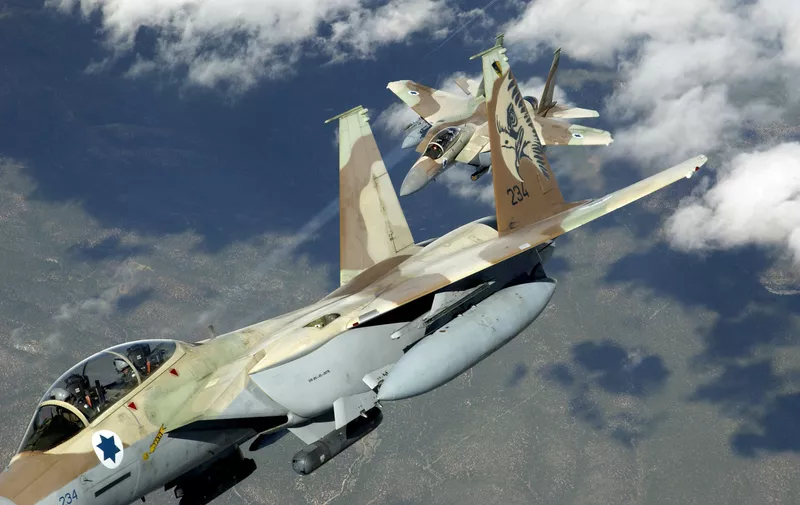 Two Israeli Defense Force-Air Force F-15D Eagle aircraft practice air defense maneuvers mission over the Nevada Test and Training Ranges, at Nellis Air Force Base (AFB), Nevada (NV), during Exercise RED FLAG 04-3. Exercise RED FLAG is a realistic combat training exercise involving the Air Forces of the US and its Allies.