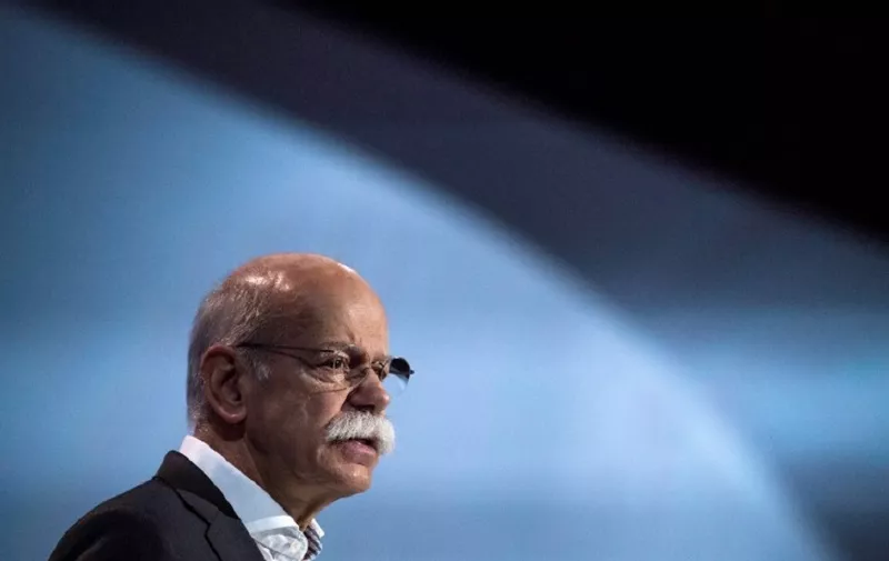CEO of German luxury car manufacturer Daimler Dieter Zetsche addresses shareholders during the company's annual general meeting in Berlin on April 5, 2018. / AFP PHOTO / John MACDOUGALL