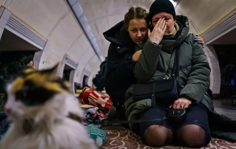 Anastasia Vakulenko, left, consoles Natalya Chikonova, right, as they seek shelter underground in a subway station on the seventh day of the Russian invasion, in Kyiv, Ukraine, Wednesday, March 2, 2022. In the foreground is ChikonovaOs cat Cinnamon. (MARCUS YAM / LOS ANGELES TIMES)
UKRAINE RUSSIA CRISIS, Kyiv, Kyiv Oblast, Ukraine - 02 Mar 2022,Image: 666034939, License: Rights-managed, Restrictions: , Model Release: no, Credit line: Profimedia