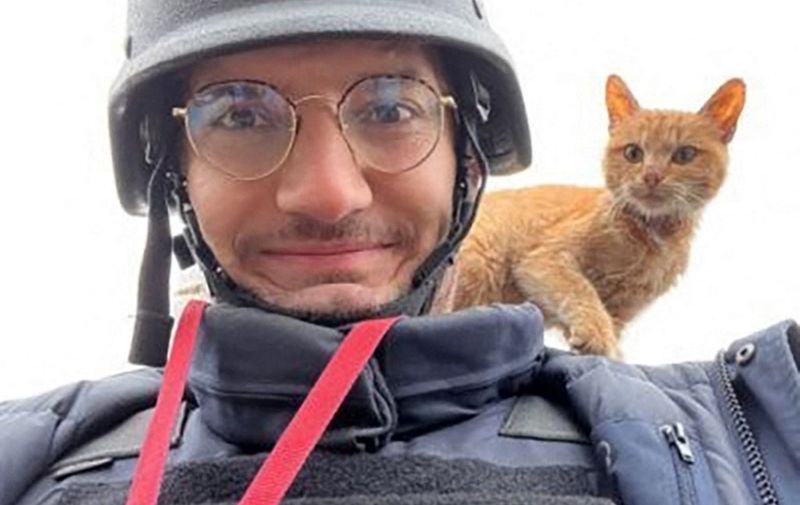 AFP journalist Arman Soldin snaps a selfie with a cat on his shoulder during an assignment for AFP in Ukraine. Arman was killed by a rocket strike as he reported with AFP colleagues from Ukrainian positions in Chasiv Yar on May 9, 2023. Arman, who was 32 and born in Bosnia, began his career as an AFP intern in the Rome bureau before moving to London in 2015. He was formally appointed as Ukraine video coordinator for AFP based in Kyiv in September 2022. Arman's death is a terrible reminder of the risks and dangers of covering this war. Our thoughts tonight are with his family and friends, and with all AFP people on the ground in Ukraine. (Photo by Arman SOLDIN / AFP)