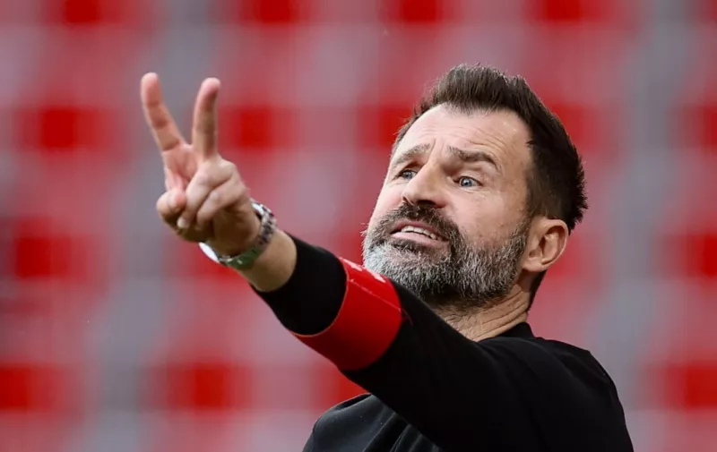 Standard's head coach Ivan Leko gestures from the technical area during the Belgian Pro League play-off football match between Standard de Liege and Oud-Heverlee Leuven at the Maurice-Dufrasne stadium in Liege on April 6, 2024. (Photo by BRUNO FAHY / Belga / AFP) / Belgium OUT