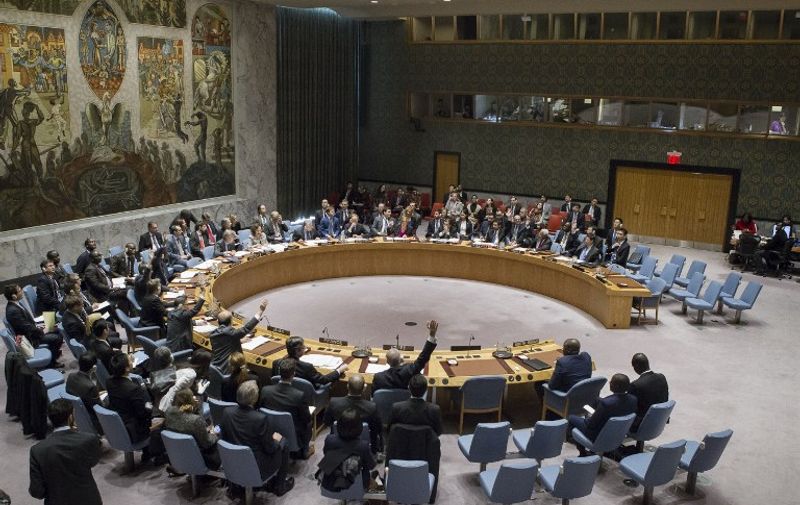 This image released by the UN shows the UN Security Council taking a vote on a draft resolution aiming to impose an arms embargo and targeted sanctions against the government of South Sudan on December 23, 2016, in New York. 
The Council rejected the US-drafted resolution on imposing an arms embargo and sanctions on South Sudan, now in its fourth year of war. The measure garnered only seven votes in favor in the 15-member council, while eight countries including Russia, China and Japan abstained.
 / AFP PHOTO / SC Chamber / Manuel ELIAS / RESTRICTED TO EDITORIAL USE - MANDATORY CREDIT "AFP PHOTO / UNITED NATIONS / Manuel ELIAS" - NO MARKETING NO ADVERTISING CAMPAIGNS - DISTRIBUTED AS A SERVICE TO CLIENTS