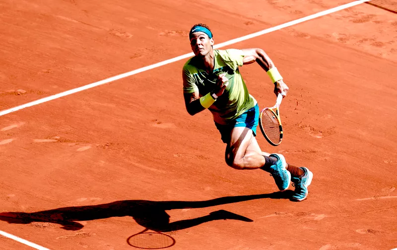 Spain's Rafael Nadal runs to return the ball to Norway's Casper Ruud during their final match of the French Open tennis tournament at the Roland Garros stadium Sunday, June 5, 2022 in Paris. (AP Photo/Thibault Camus)