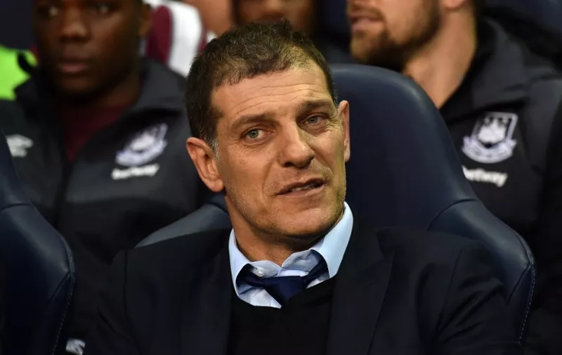 West Ham United's Croatian manager Slaven Bilic looks on ahead of the English Premier League football match between Tottenham Hotspur and West Ham United at White Hart Lane in north London on November 22, 2015. AFP PHOTO / BEN STANSALL

RESTRICTED TO EDITORIAL USE. No use with unauthorized audio, video, data, fixture lists, club/league logos or 'live' services. Online in-match use limited to 75 images, no video emulation. No use in betting, games or single club/league/player publications. / AFP / BEN STANSALL