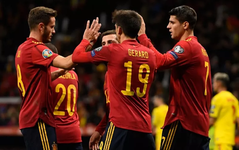 Spain's players celebrate after a goal during the Euro 2020 Group F qualification football match between Spain and Romania at the Wanda Metropolitano Stadium in Madrid on November 18, 2019. (Photo by PIERRE-PHILIPPE MARCOU / AFP)