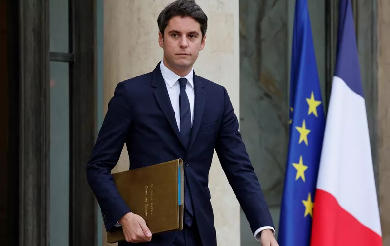 French Education and Youth Minister Gabriel Attal leaves after a cabinet meeting at the presidential Elysee Palace in Paris, on December 12, 2023. On December 11, 2023, the French lower house of parliament adopted a motion to reject a highly controversial immigration bill, dealing a major blow to the government of President Emmanuel Macron, who has refused his Interior Minister Gerald Darmanin's resignation and asked for "a follow-up to this text" to be presented to him on December 12. (Photo by Ludovic MARIN / AFP)
