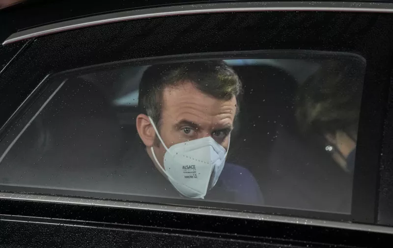 French President Emmanuel Macron looks out of her car window as he arrives for a meeting with German Chancellor Olaf Scholz at the chancellery in Berlin, Germany, Tuesday, Jan. 25, 2022. German and French leaders are meeting in Berlin over the Ukraine crisis and other European issues. //04SIPA_1.1844/2201260936/Credit:Markus Schreiber-POOL/SIPA/2201260943,Image: 656494547, License: Rights-managed, Restrictions: , Model Release: no, Credit line: Profimedia
