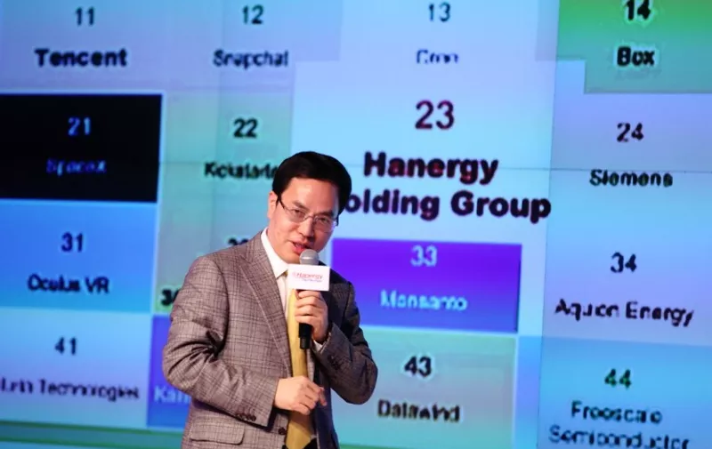 --FILE--Li Hejun, Chairman and CEO of Hanergy Holding Group Limited, speaks at a launch event for Hanergy's new energy strategies in Beijing, China, 2 February 2015.

Short sellers bowed out on Hanergy Thin Film Power Group Ltd. at just the wrong time. Bearish wagers on the Hong Kong-listed solar-panel maker fell to 3.1 percent of its outstanding shares on Monday (18 May 2015), the lowest level since December 2013, according to data. Short interest dropped from 2014's high of 5.1 percent as the stock surged 162 percent this year through Tuesday, the most among more than 2,400 members on the MSCI All-Country World Index. Hanergy's shares began plunging at 10:16 a.m. in Hong Kong. By the time trading halted 24 minutes later, the stock had fallen 47 percent and erased $18.6 billion in market capitalization. Short sellers gave up betting against the stock because its rally made the trade too unprofitable, according to Andrew Sullivan, head of sales trading at Haitong International Securities Group. The company's first statement Wednesday didn't give a reason for the suspension. A subsequent statement from Hanergy said the stock has been suspended pending "an announcement containing inside information."