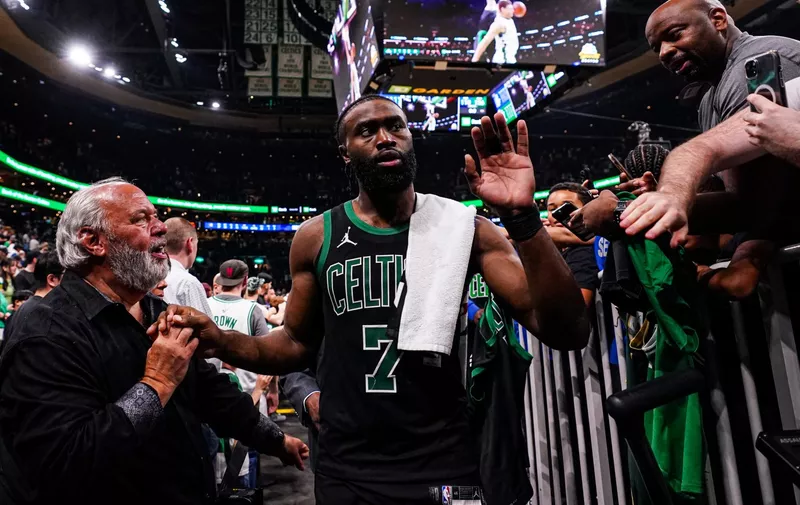 May 23, 2024; Boston, Massachusetts, USA; Boston Celtics guard Jaylen Brown (7) exits the court after defeating the Indiana Pacers during game two of the eastern conference finals for the 2024 NBA playoffs at TD Garden. Mandatory Credit: David Butler II-USA TODAY Sports