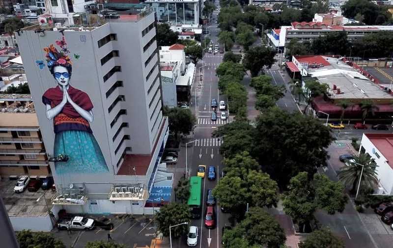 Aerial view of Irish urban artist Fin Dac's mural "Magdalena", in honor of Mexican painter Magdalena Carmen Frida Kahlo, in the month of her birth, in Guadalajara, Jalisco state, Mexico, on July 14, 2019. (Photo by ULISES RUIZ / AFP)