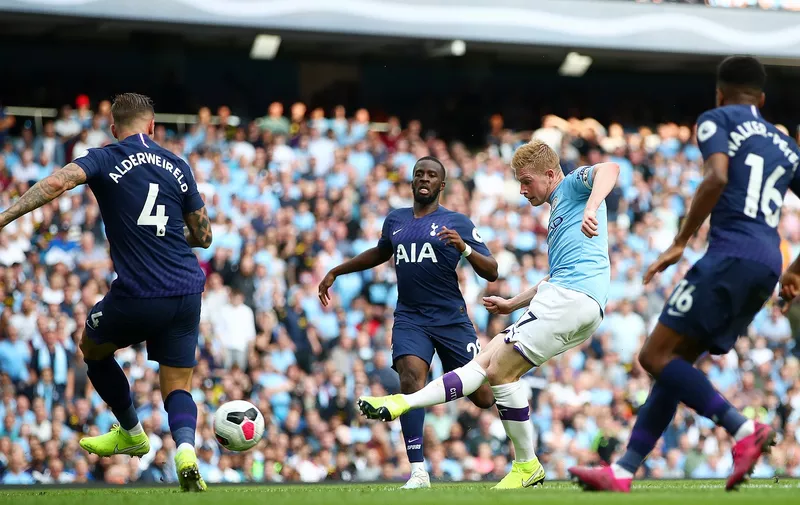 MANCHESTER, ENGLAND - AUGUST 17: Kevin De Bruyne of Manchester City shoots during the Premier League match between Manchester City and Tottenham Hotspur at Etihad Stadium on August 17, 2019 in Manchester, United Kingdom. (Photo by Clive Brunskill/Getty Images)