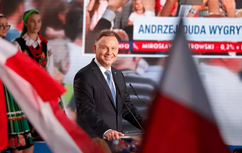 Polish President Andrzej Duda addresses supporters as exit poll results were announced during the presidential election in Lowicz, Poland, on June 28, 2020. - Poland's right-wing President Andrzej Duda topped round one of a presidential election on June 28, 2020, triggering a tight run-off with Warsaw's liberal Mayor Rafal Trzaskowski on July 12, according to an Ipsos exit poll. (Photo by Wojtek RADWANSKI / AFP)