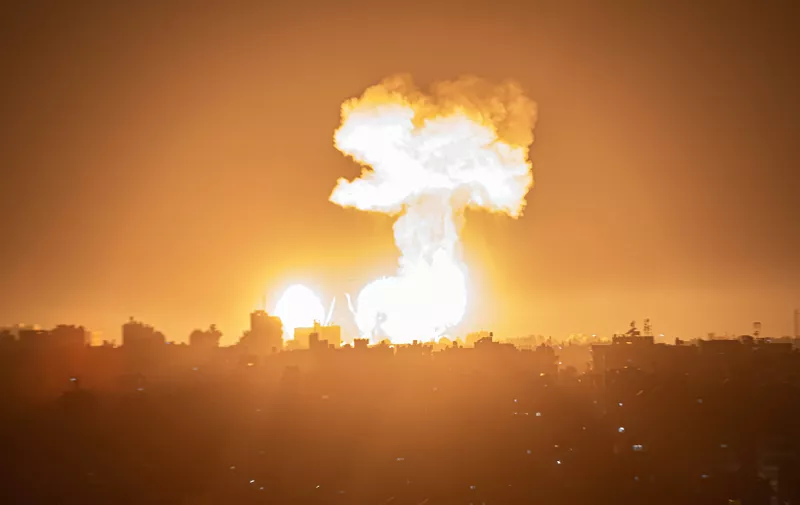 December 4, 2022, Gaza, Palestine: Smoke and flames rise during an Israeli air strike on Khan Yunis in the southern Gaza Strip, in response to a missile that was fired from Gaza towards Israel.,Image: 742232719, License: Rights-managed, Restrictions: , Model Release: no