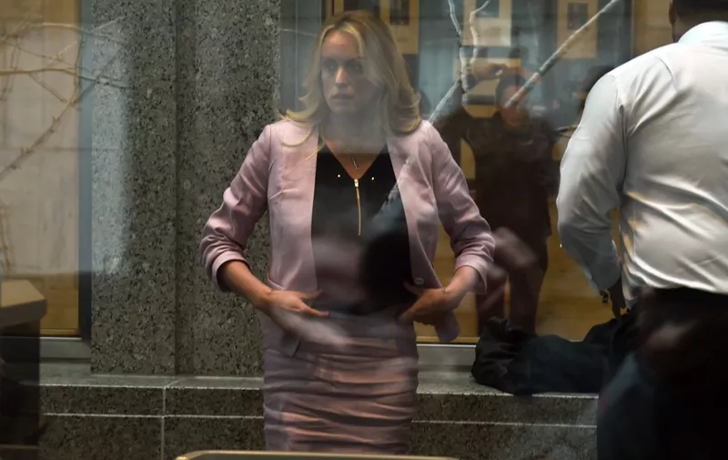 Adult-film actress Stephanie Clifford, also known as Stormy Daniels arrives for a court hearing at the US Courthouse in New York on April 16, 2018. - President Donald Trump's personal lawyer Michael Cohen has been under criminal investigation for months over his business dealings, and FBI agents last week raided his home, hotel room, office, a safety deposit box and seized two cellphones. (Photo by HECTOR RETAMAL / AFP)