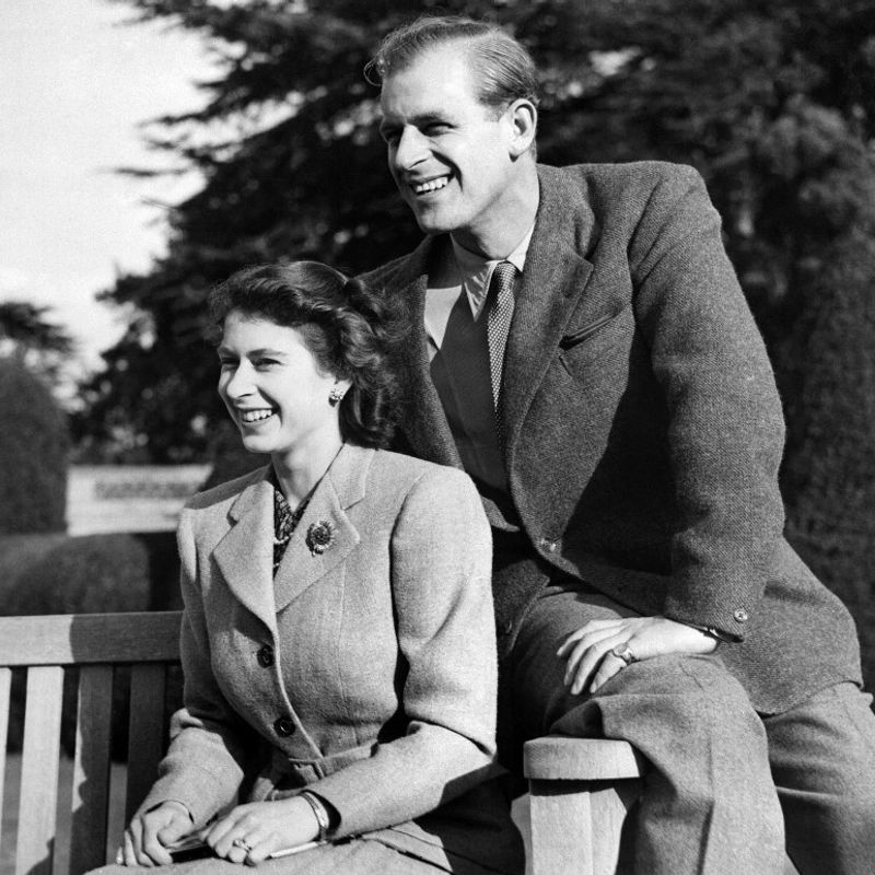 Britain's Princess Elizabeth (future Queen Elizabeth II) and her husband Philip, Duke of Edinburgh, pose during their honeymoon, November 25, 1947 in Broadlands estate, Hampshire. (Photo by - / - / AFP)