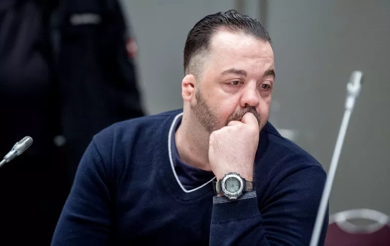 Former nurse Niels Hoegel, accused of killing more than 100 patients in his care, waits at court for his verdict at court in Oldenburg, northern Germany, on June 6, 2019. - Hoegel was handed a life sentence for killing 85 patients in his care. The man accused of being post-war Germany's most prolific serial killer was known to colleagues as a "nice guy" who did little to arouse suspicion until well into his murder spree. (Photo by Hauke-Christian Dittrich / POOL / AFP)
