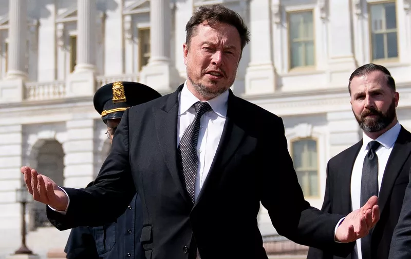 Elon Musk departs following a meeting in the office of US House Speaker Kevin McCarthy (R-CA), at the US Capitol in Washington, DC, on September 13, 2023.  (Photo by Stefani Reynolds / AFP)