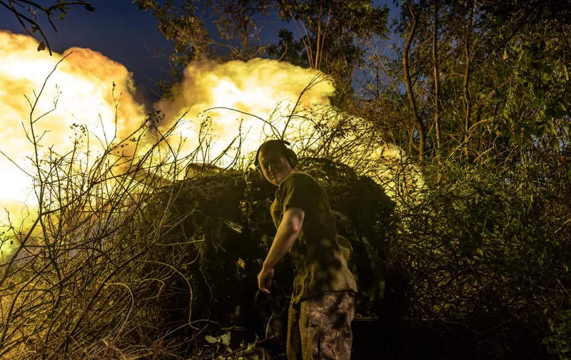 DONETSK OBLAST, UKRAINE - AUGUST 14: A Ukrainian soldier of the Aidar battalion, fires D-30 artillery in the direction of Bakhmut frontline as Russia-Ukraine war continues in Donetsk Oblast, Ukraine on August 14, 2023. Diego Herrera Carcedo / Anadolu Agency/ABACAPRESS.COM,Image: 797674019, License: Rights-managed, Restrictions: , Model Release: no