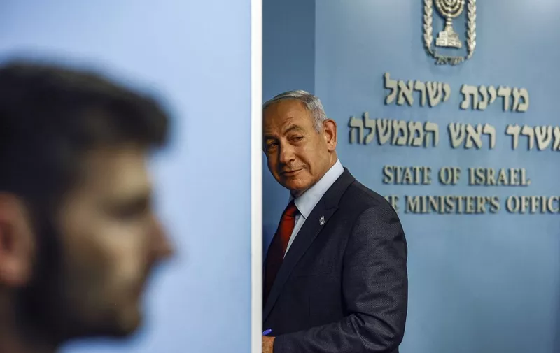 Israeli Prime Minister Benjamin Netanyahu looks on during a press conference at the Prime Minister's office in Jerusalem on January 25, 2023. (Photo by RONEN ZVULUN / POOL / AFP)