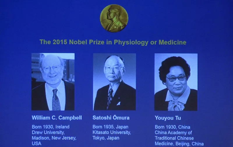 The portraits of the winners of the Nobel Medicine Prize 2015 (L-R) Irish-born William Campbell, Satoshi Omura of Japan and China's Youyou Tu are displayed on a screen during a press conference of the Nobel Committee to announce the winners of the 2015 Nobel Medicine Prize on October 5, 2015 at the Karolinska Institutet in Stockholm, Sweden.    AFP PHOTO / JONATHAN NACKSTRAND