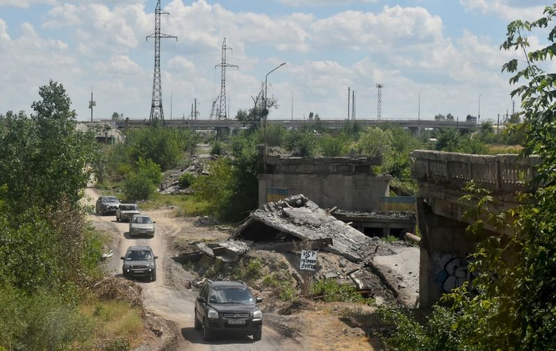 A view of a destroyed bridge in the city of Severodonetsk on July 12, 2022, amid the ongoing Russian military action in Ukraine. (Photo by Olga MALTSEVA / AFP)