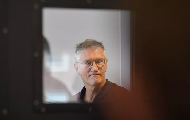 State epidemiologist Anders Tegnell of the Public Health Agency of Sweden is seen through a door glass prior to a daily news conference on the new coronavirus COVID-19 situation, in Stockholm, Sweden, on April 28, 2020. (Photo by Jessica GOW / TT NEWS AGENCY / AFP) / Sweden OUT