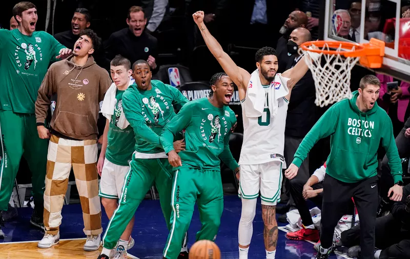 Boston Celtics forward Jayson Tatum (0) reacts as his team holds the lead during the second half of Game 4 of an NBA basketball first-round playoff series against the Brooklyn Nets, Monday, April 25, 2022, in New York. (AP Photo/John Minchillo)
