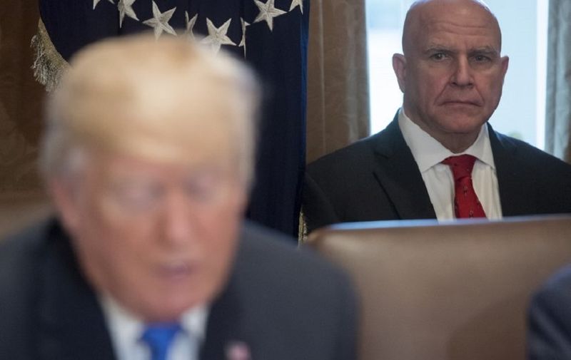 National Security Adviser H.R. McMaster alongside US President Donald Trump as he holds a Cabinet Meeting in the Cabinet Room at the White House in Washington, DC, December 20, 2017.
US President Donald Trump on Wednesday hailed the imminent adoption of a sweeping Republican tax cut plan as a "victory" for the country.
 / AFP PHOTO / SAUL LOEB