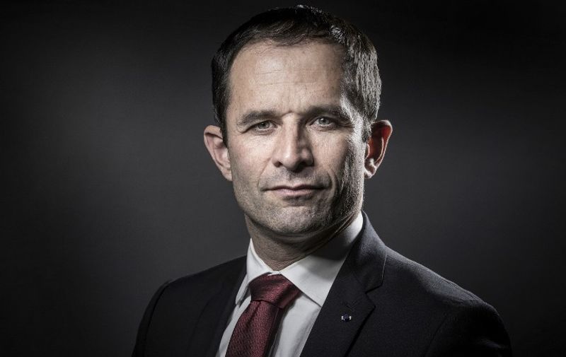 (FILES) This file photo taken on December 15, 2016 shows candidate for the Socialist Party (PS) primaries ahead of the 2017 presidential election Benoit Hamon posing during a photo session in Paris. 
Outsider Benoit Hamon came first in the French Socialists' presidential primary on January 22, 2017, and will stand against former prime minister Manuel Valls in a January 29 runoff, partial results showed. / AFP PHOTO / JOEL SAGET