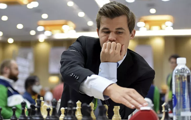 Norway's Magnus Carlsen competes during his Round 10 game against the Moldova's team at the 44th Chess Olympiad 2022, in Mahabalipuram on August 8, 2022. (Photo by Arun SANKAR / AFP)