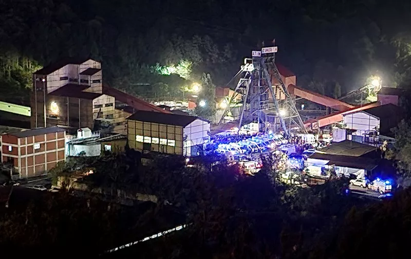 Ambulances and firefighters arrive at the site of an explosion that occurred at a coal mine in Bartin, northern Turkey, on October 14 2022. - According to Bartin's governor, 49 mine workers are trapped after the mine blast. Dozens of coalminers were believed to be trapped hundreds of metres below ground Friday after a methane gas blast tore through a pit along the Black Sea coast of Turkey. (Photo by IHLAS NEWS AGENCY / AFP)
