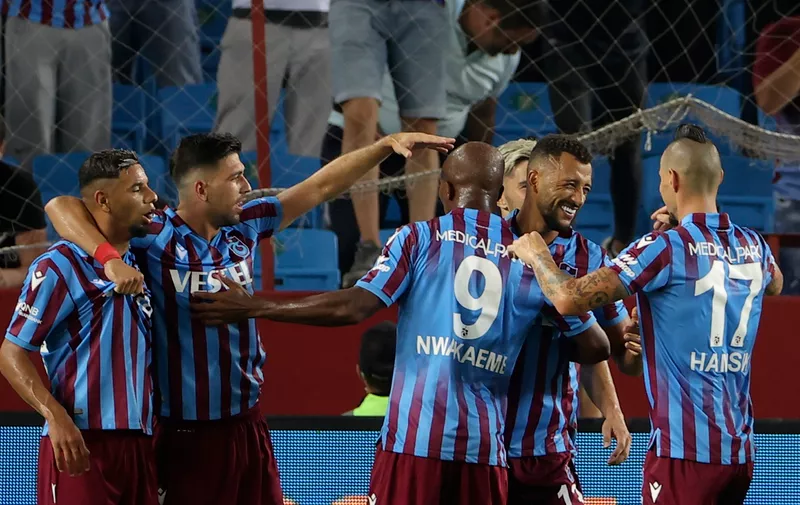 Trabzonspor's Vitor Hugo Franchescoli De Souza celebrates with teammates after scoring his side's second goal during the Europa Conference League, third qualifying round, first leg soccer match between Trabzonspor and Norway's Molde, at Yeni stadium, in Trabzon, Turkey, Thursday, Aug. 5, 2021. (AP Photo)