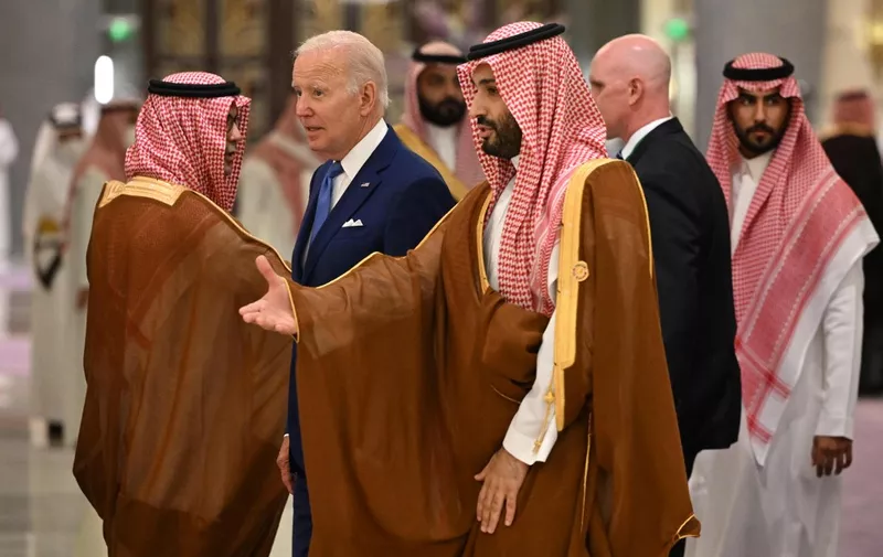US President Joe Biden (C-L) and Saudi Crown Prince Mohammed bin Salman (C) arrive for the family photo during the Jeddah Security and Development Summit (GCC+3) at a hotel in Saudi Arabia's Red Sea coastal city of Jeddah on July 16, 2022. (Photo by MANDEL NGAN / POOL / AFP)