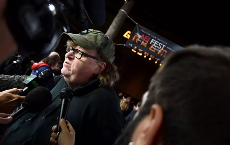 HOLLYWOOD, CA - NOVEMBER 07: Filmmaker Michael Moore attends the Centerpiece Gala Premiere of Dog Eat Dog Films' "Where to Invade Next" during AFI FEST 2015 presented by Audi at the Egyptian Theatre on November 7, 2015 in Hollywood, California.   Kevin Winter/Getty Images For FYI/AFP