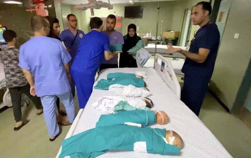 GAZA CITY, GAZA - NOVEMBER 14: (----EDITORIAL USE ONLY - MANDATORY CREDIT - 'PALESTINIAN PRIME MINISTRY / HANDOUT' - NO MARKETING NO ADVERTISING CAMPAIGNS - DISTRIBUTED AS A SERVICE TO CLIENTS----) A screen grab captured from a video shows premature babies under treatment in the neonatal intensive care unit remove from the incubators and transferred to another department in the hospital after Israeli attack on Shifa Hospital in Gaza City, Gaza on November 14, 2023. Palestinian Prime Ministry / Anadolu (Photo by Palestinian Prime Ministry / ANADOLU / Anadolu via AFP)