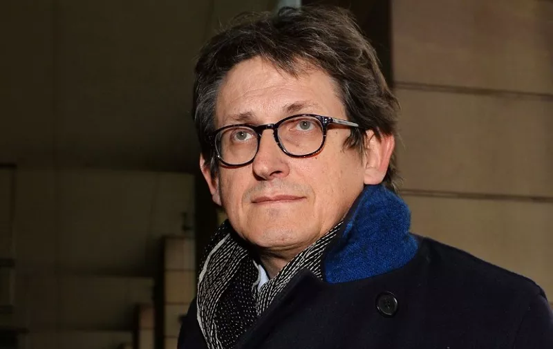 The editor of Britain's Guardian newspaper, Alan Rusbridger, arrives at Portcullis House in London on December 3, 2013, to appear before lawmakers to defend his newspaper's publication of intelligence documents leaked by former US intelligence analyst Edward Snowden. Parliament's home affairs committee is questioning Rusbridger as part of its investigation into counter-terrorism, amid claims the newspaper endangered national security by publishing details of US and British spying. AFP PHOTO/BEN STANSALL / AFP PHOTO / BEN STANSALL