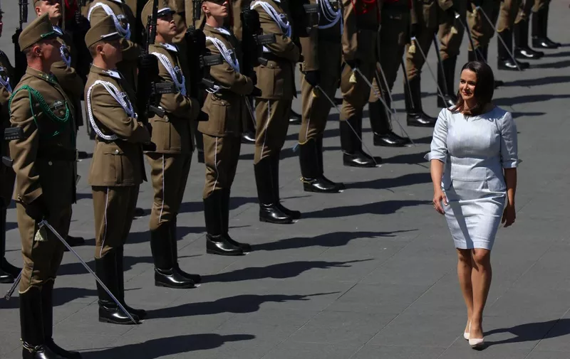 Hungary's new President Katalin Novak inspects a military honor guard during her inauguration ceremony in front of the parliament building on May 14, 2022 in Budapest. (Photo by Ferenc Isza / AFP)