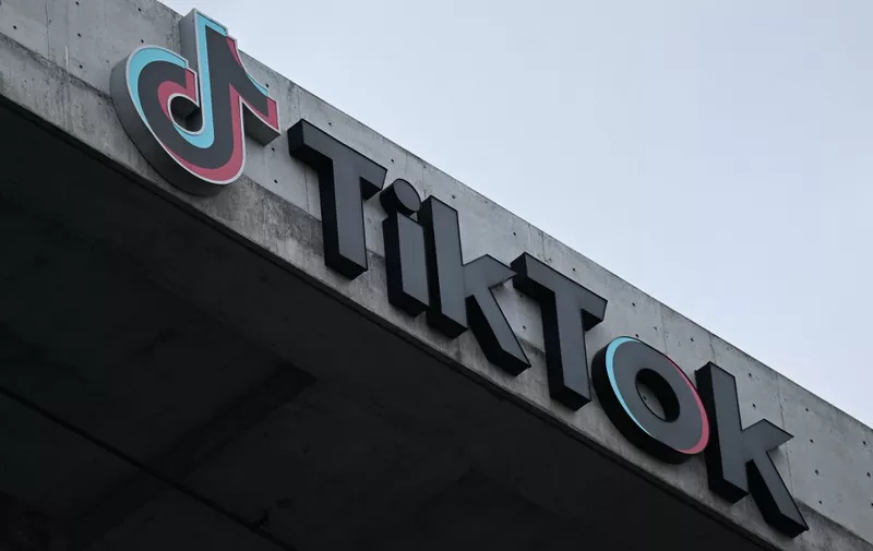 (FILES) The TikTok logo is displayed outside TikTok social media app company offices in Culver City, California, on March 16, 2023. Beijing warned on March 13, 2024 that a proposed ban on Chinese-owned video-sharing app TikTok would "inevitably come back to bite the United States". (Photo by Patrick T. Fallon / AFP)