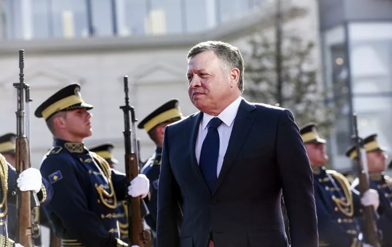 Jordanian King Abdullah II reviews Kosovo's Security Force honor guard during a welcoming ceremony as part of Abdullah's official visit to Kosovo in Pristina on November 17, 2015 . AFP PHOTO/ARMEND NIMANI